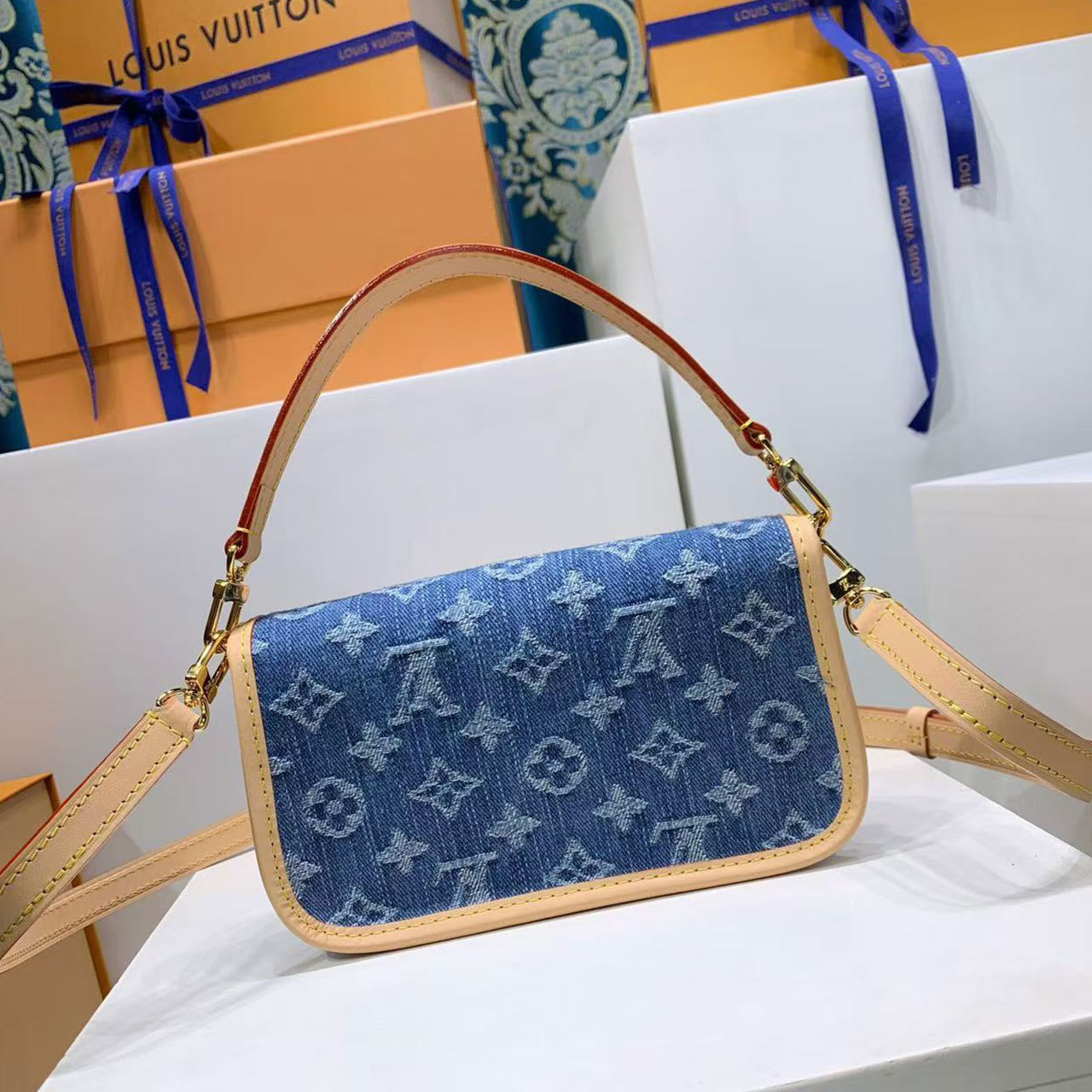 LV retro washed denim vintage flower stick armpit bag