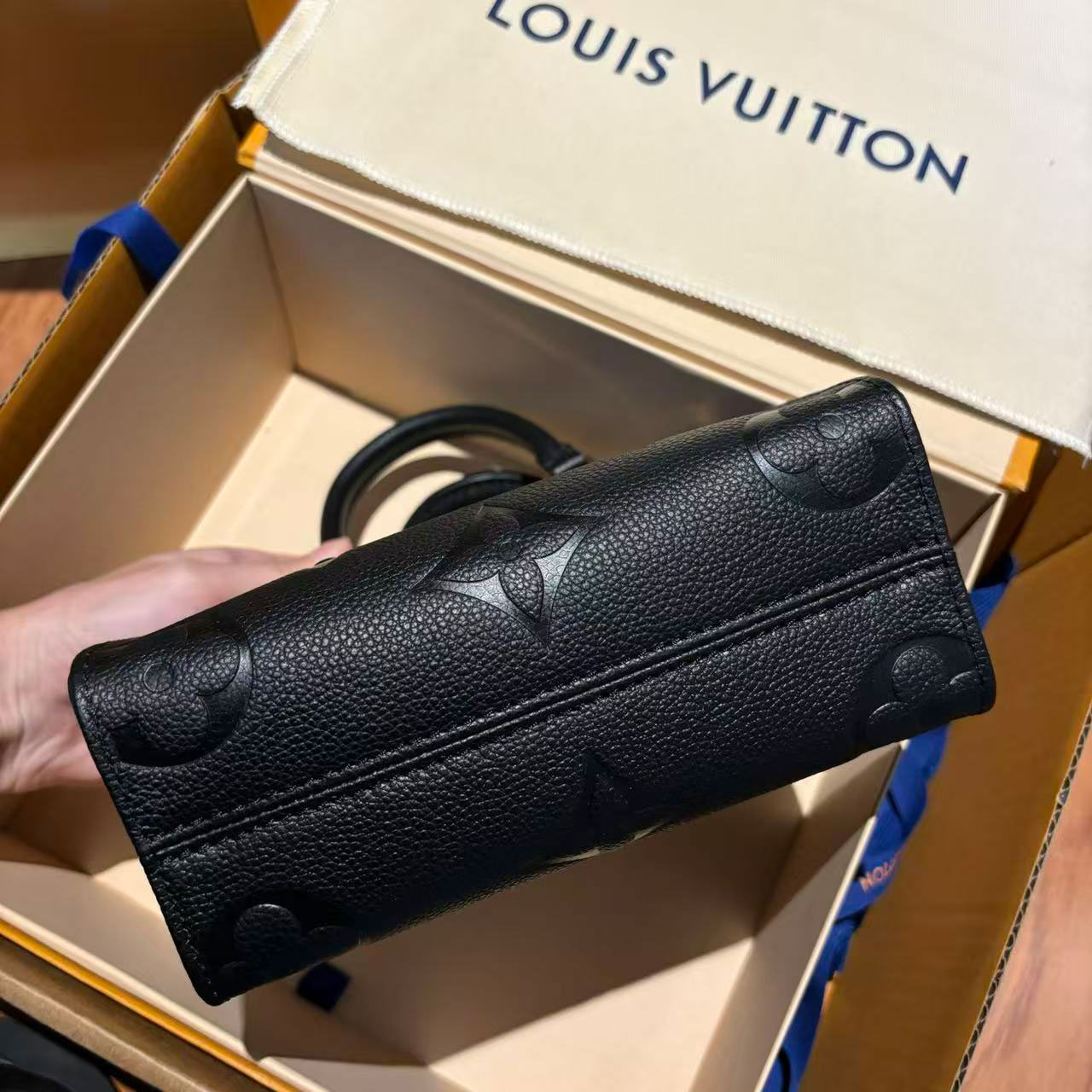 LV black embossed cowhide mini Onthego tote bag