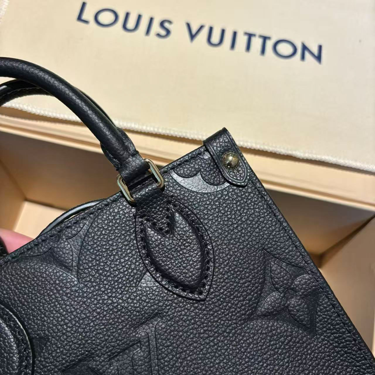 LV black embossed cowhide mini Onthego tote bag