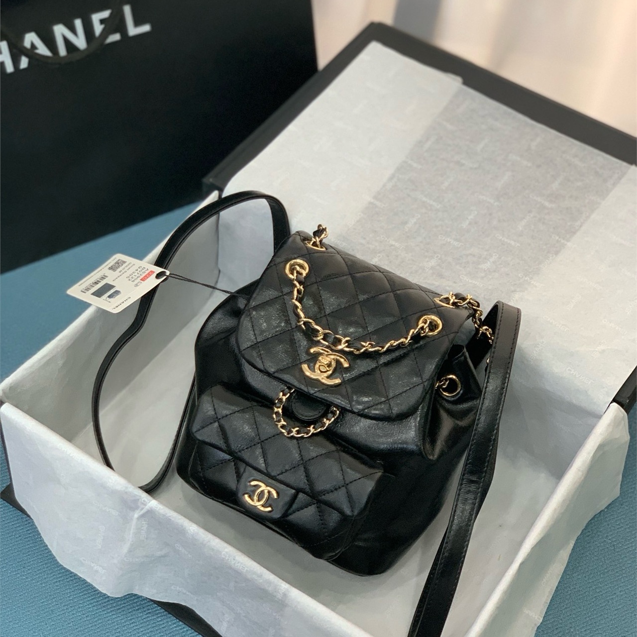 CHANEL black oil wax leather diamond grid mini backpack