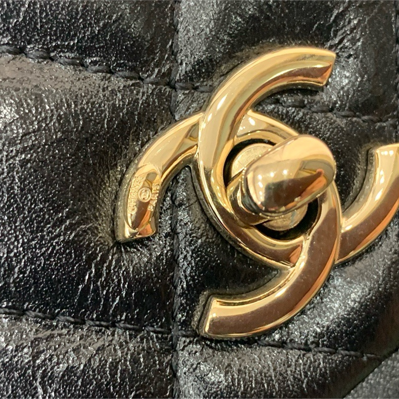 CHANEL black oil wax leather diamond grid mini backpack