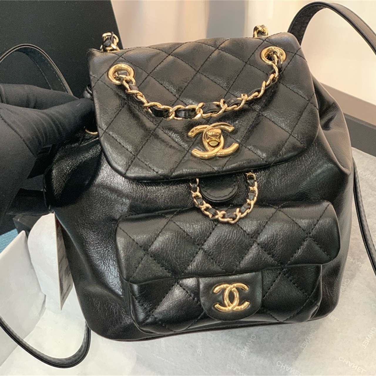 CHANEL black oil wax leather diamond grid mini backpack