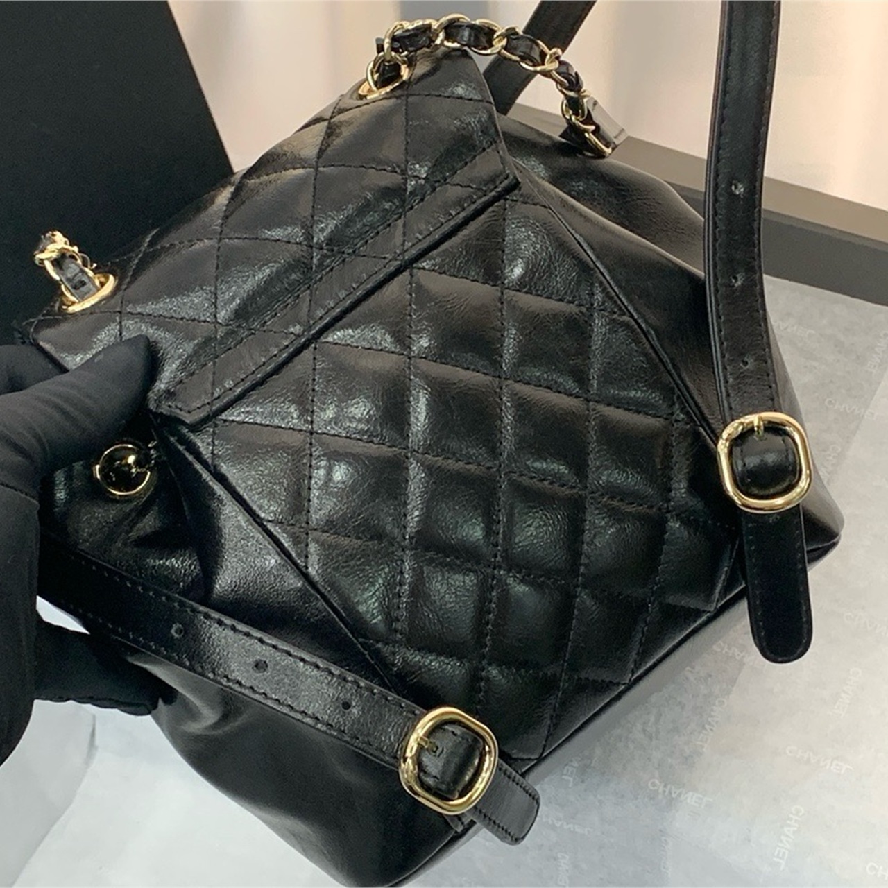 CHANEL black oil wax leather diamond grid mini backpack