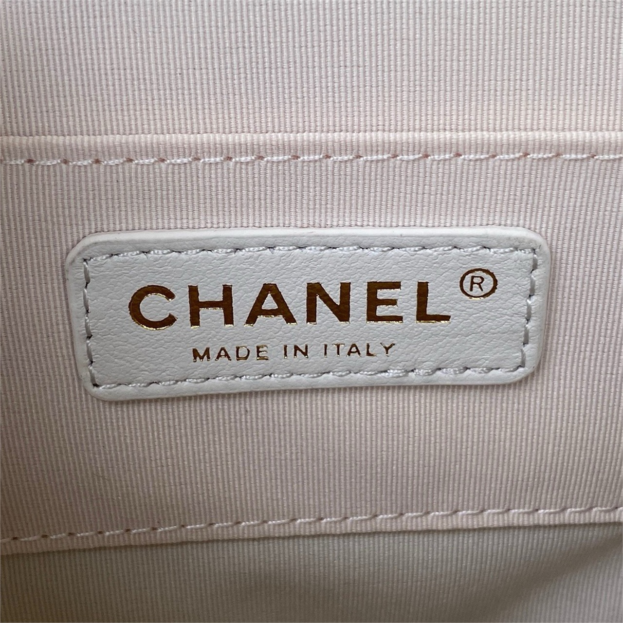CHANEL beige lambskin diamond grid mini backpack
