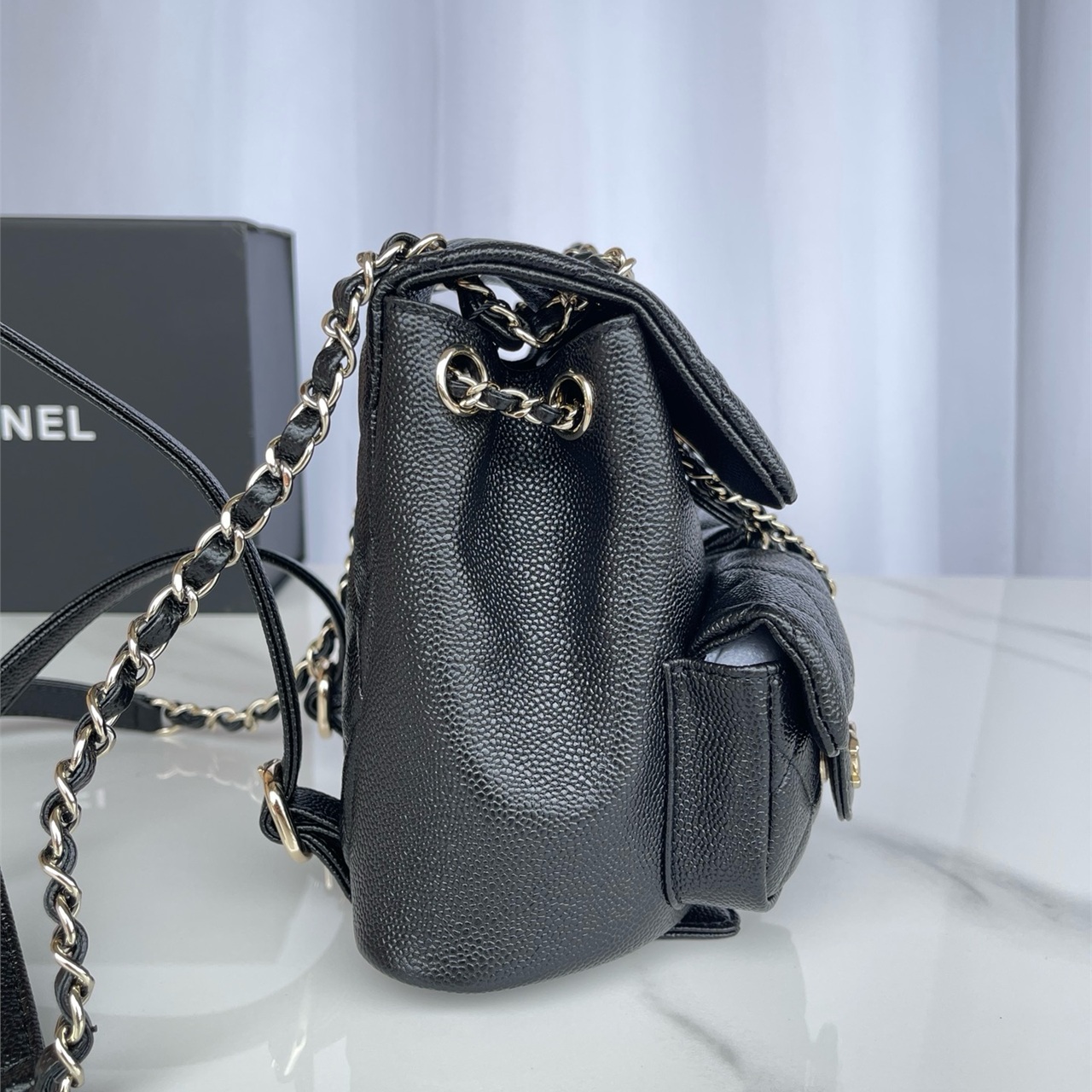 CHANEL black caviar cowhide three pocket mini backpack