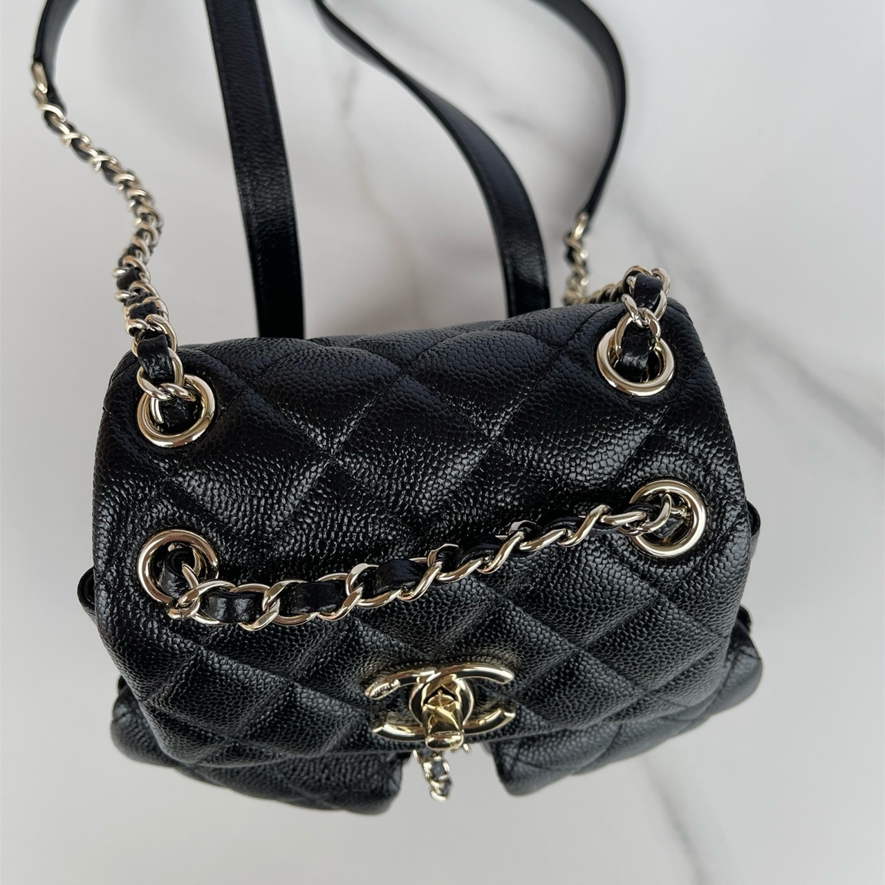 CHANEL black caviar cowhide three pocket mini backpack