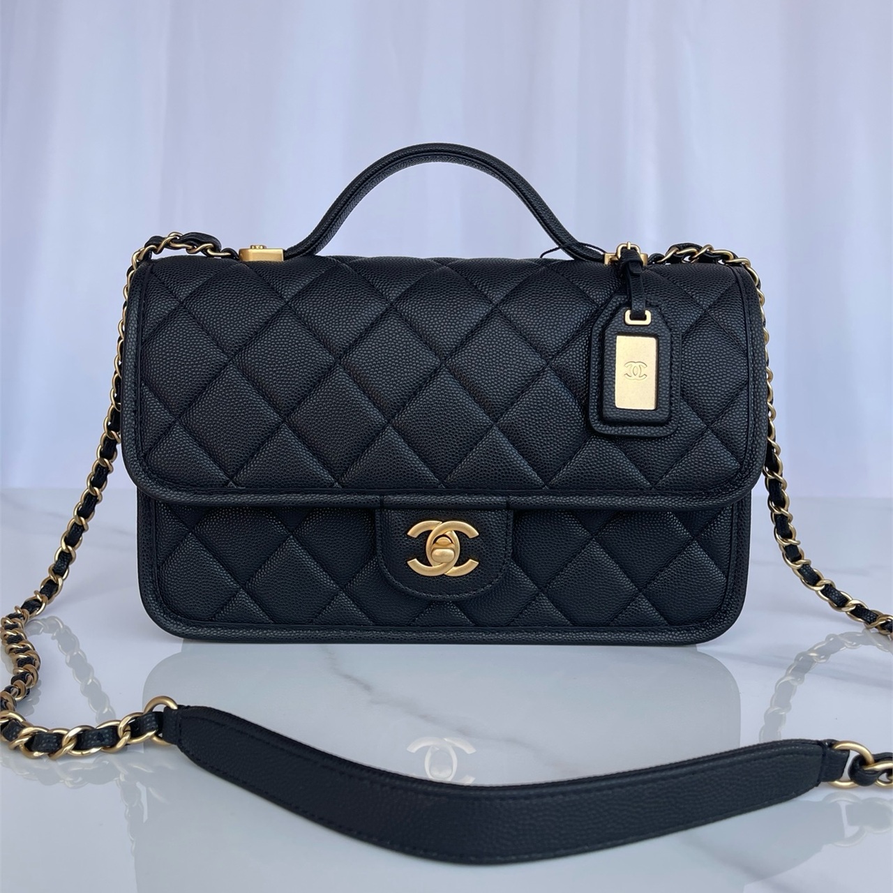 CHANEL beige caviar cowhide hand-held CF tag chain bag