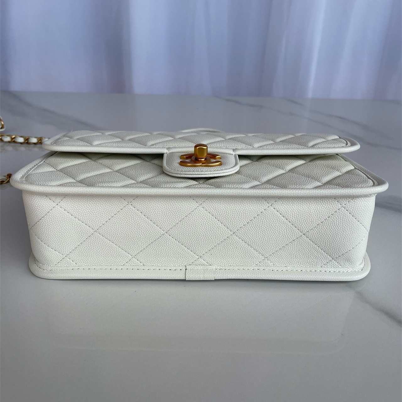 CHANEL beige caviar cowhide hand-held CF tag chain bag