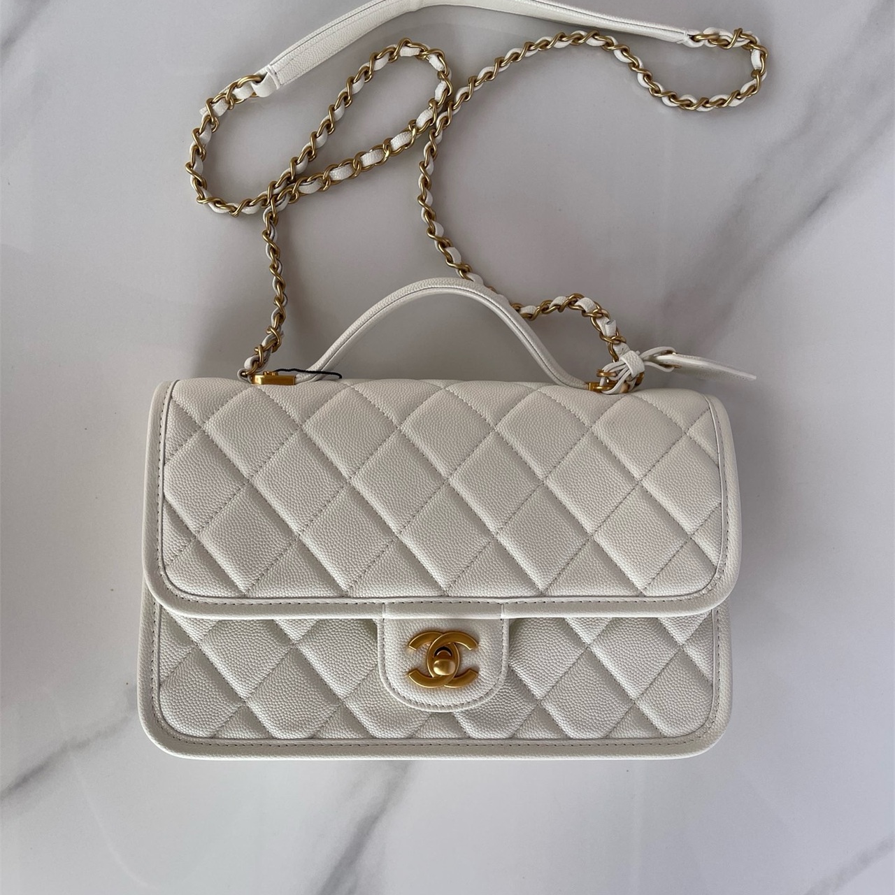 CHANEL beige caviar cowhide hand-held CF tag chain bag