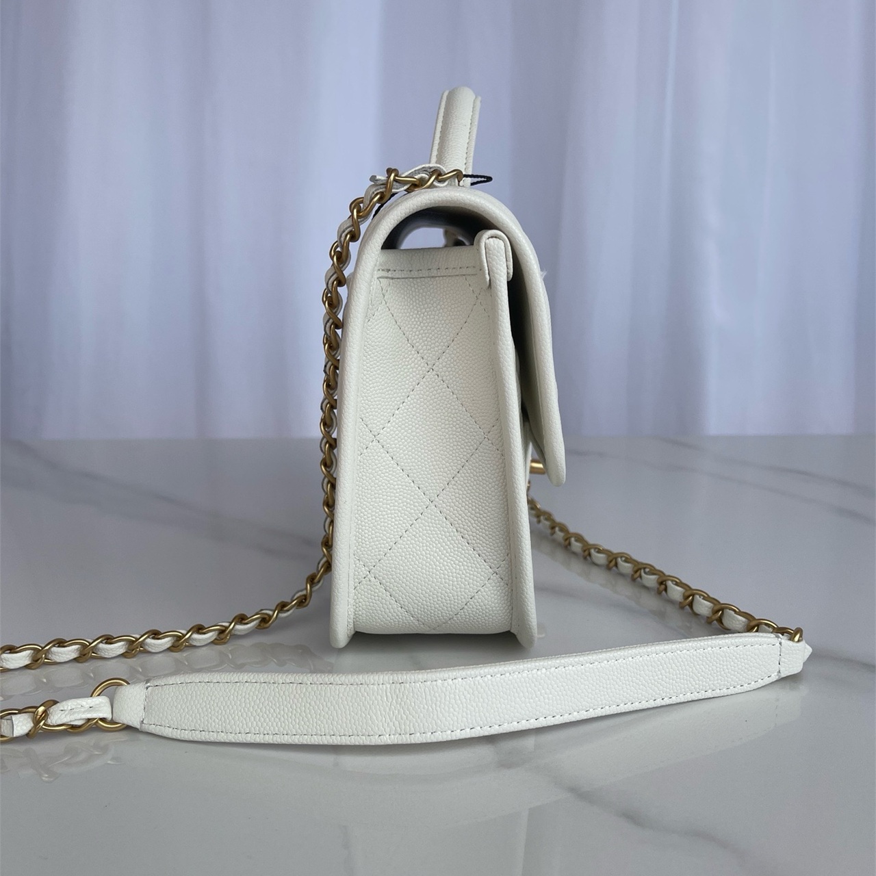 CHANEL beige caviar cowhide hand-held CF tag chain bag
