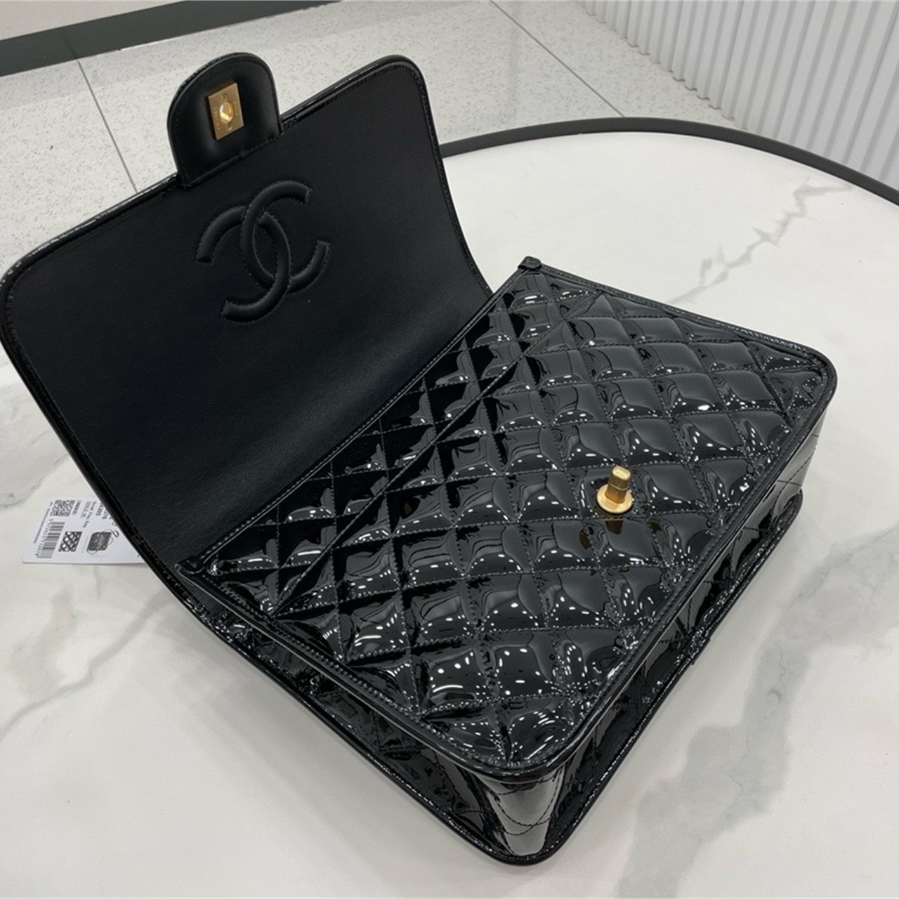 CHANEL shiny black patent leather diamond grid hand-held document mailman bag