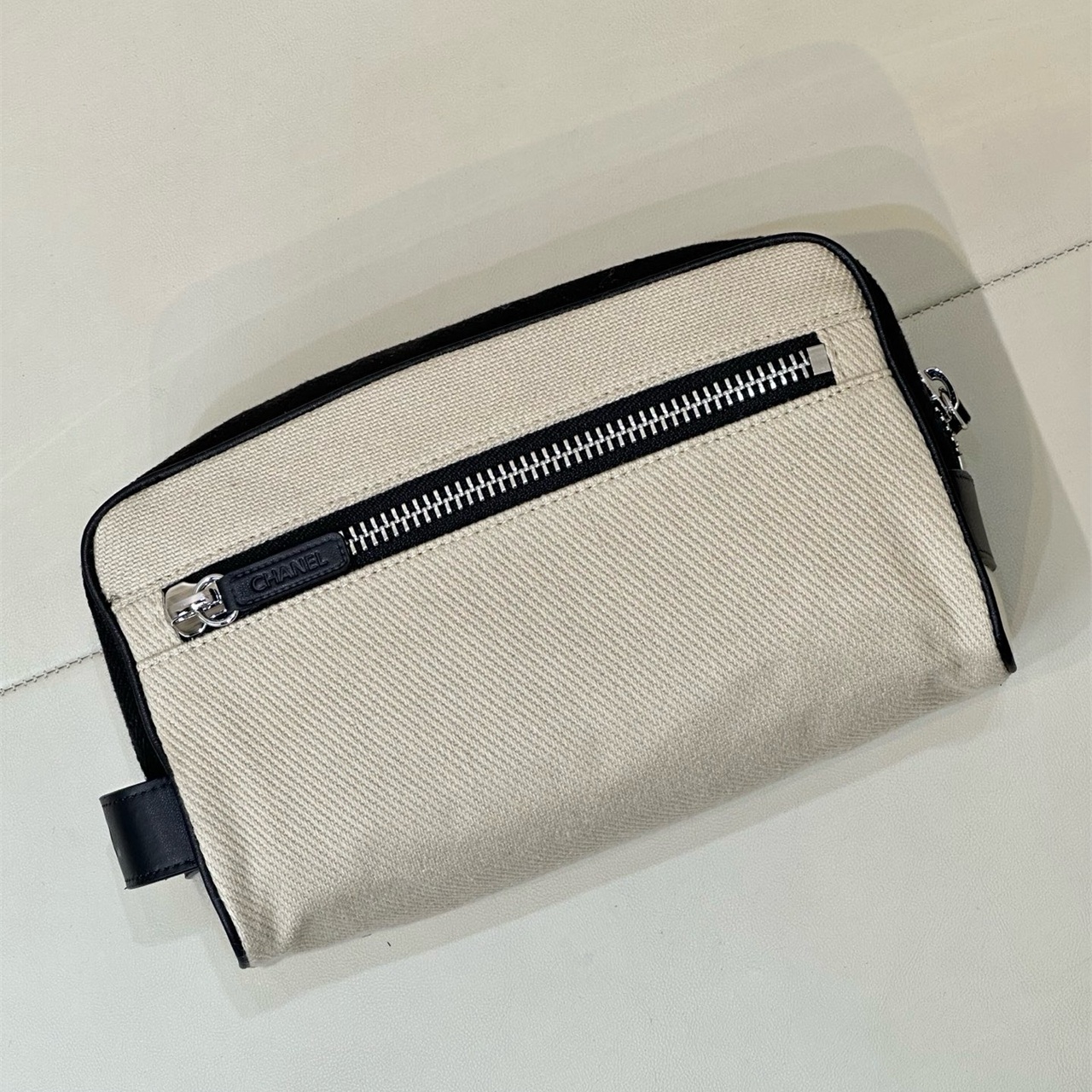 CHANEL white canvas with black leather zipper makeup storage handbag