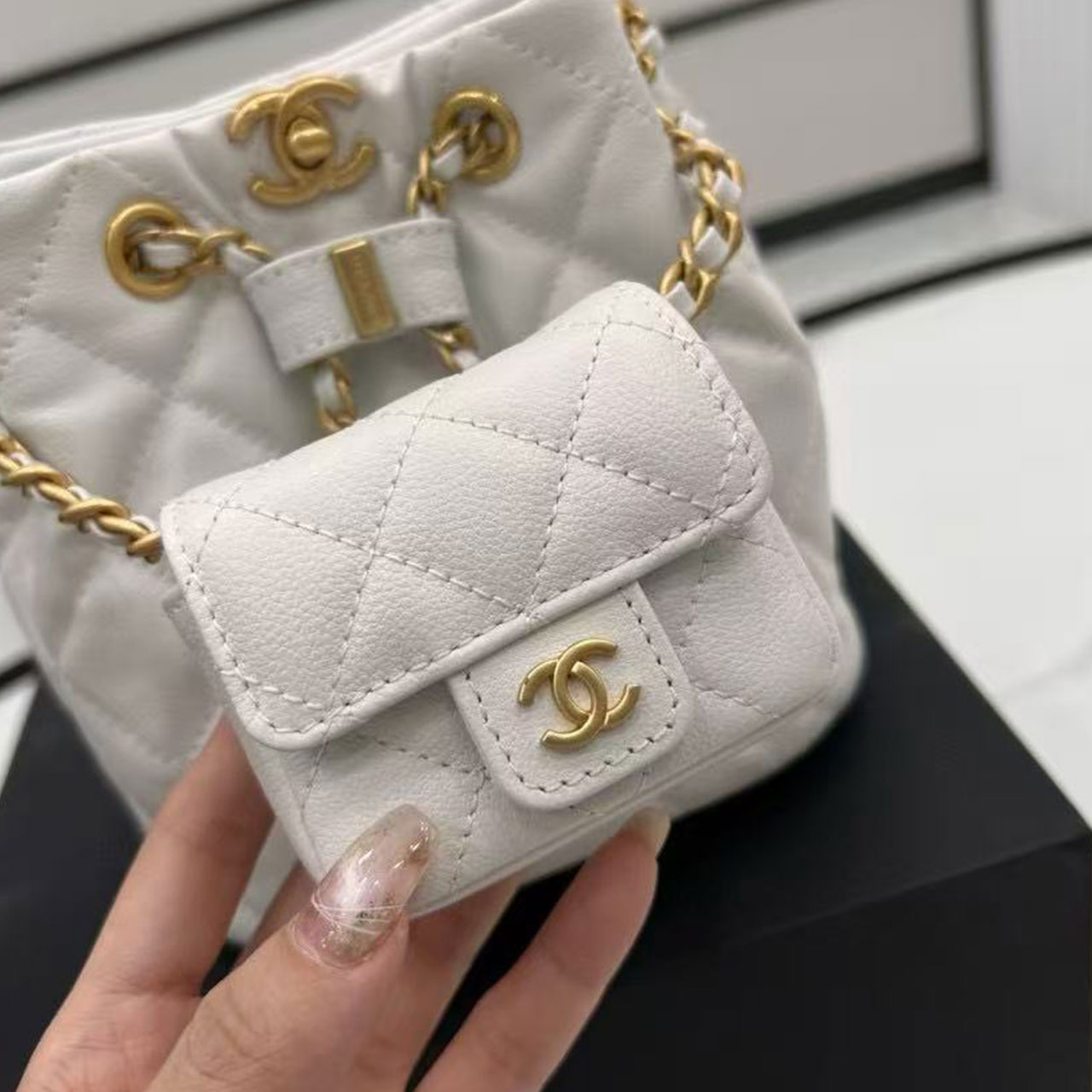 CHANEL milk white caviar diamond grid mini mother and child drawstring bucket bag