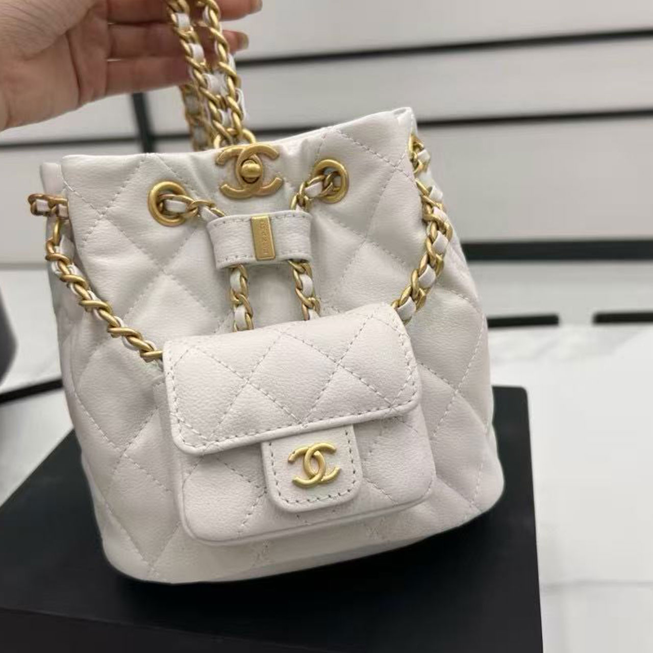 CHANEL milk white caviar diamond grid mini mother and child drawstring bucket bag