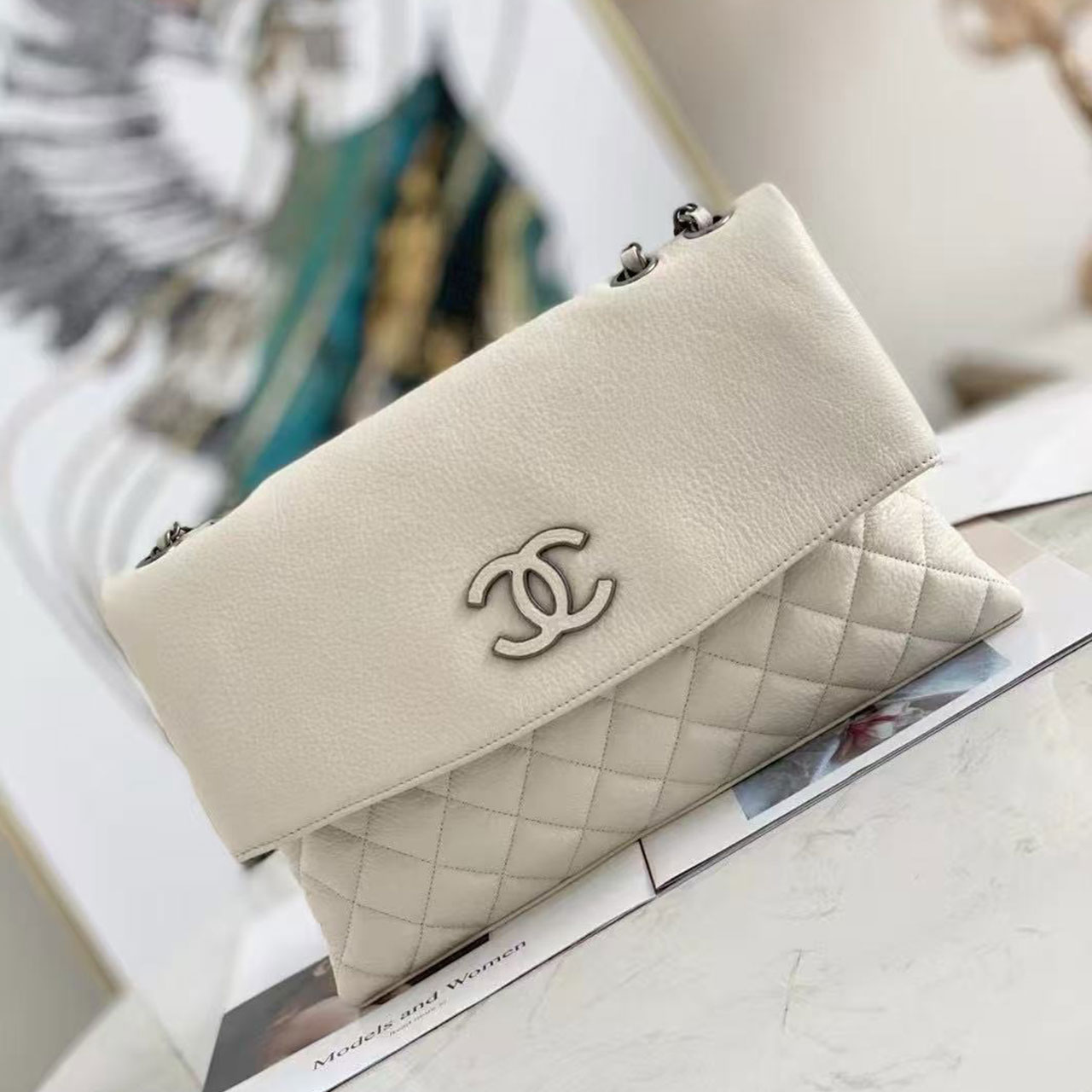 CHANEL black grain cowhide splicing diamond grid flip chain bag