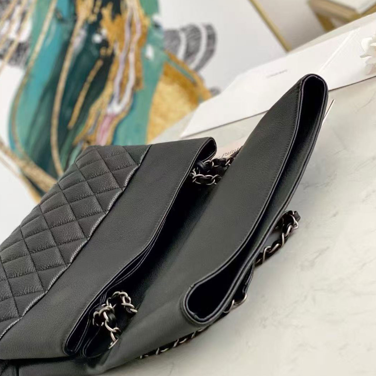 CHANEL black grain cowhide splicing diamond grid flip chain bag