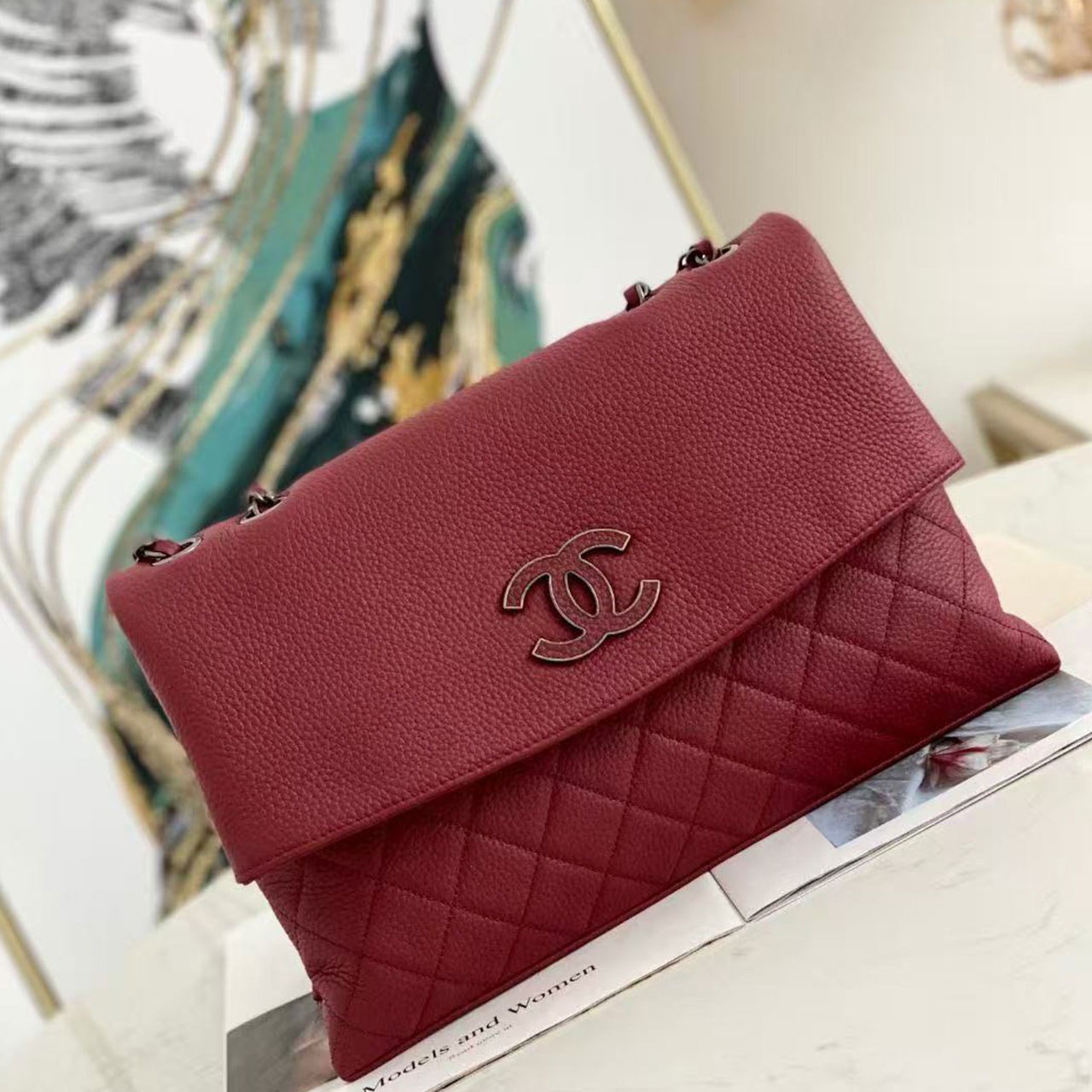 CHANEL black grain cowhide splicing diamond grid flip chain bag