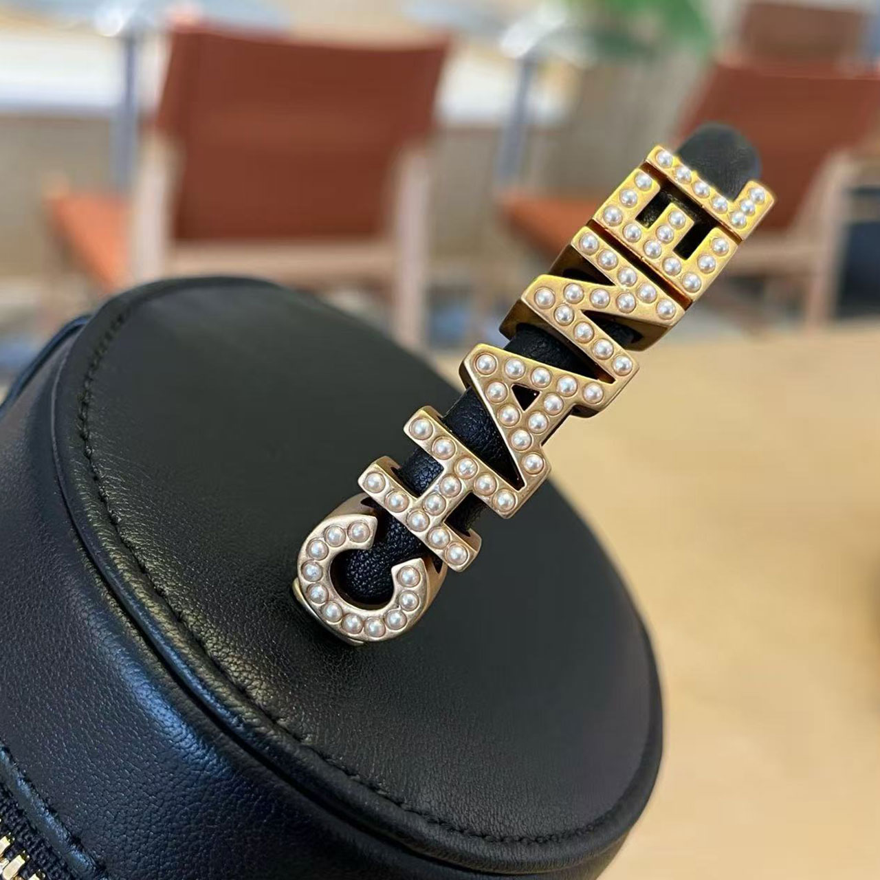 CHANEL black glossy cowhide diamond grid cylindrical makeup bucket bag