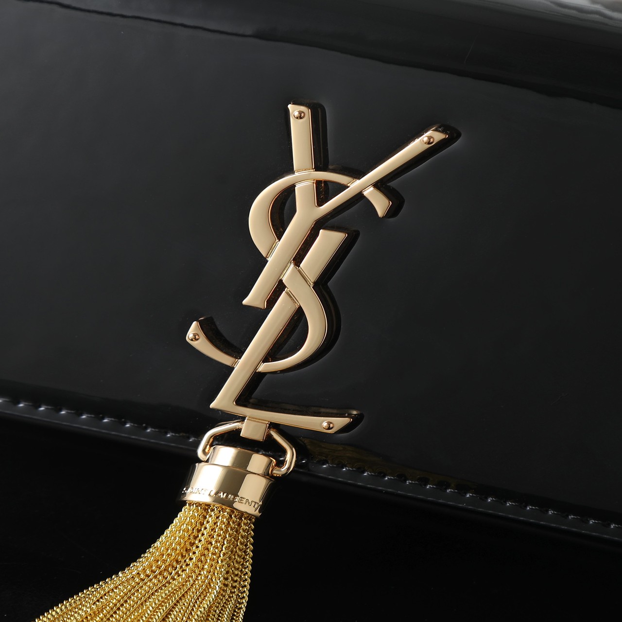 YSL black patent leather gold buckle with tassel
